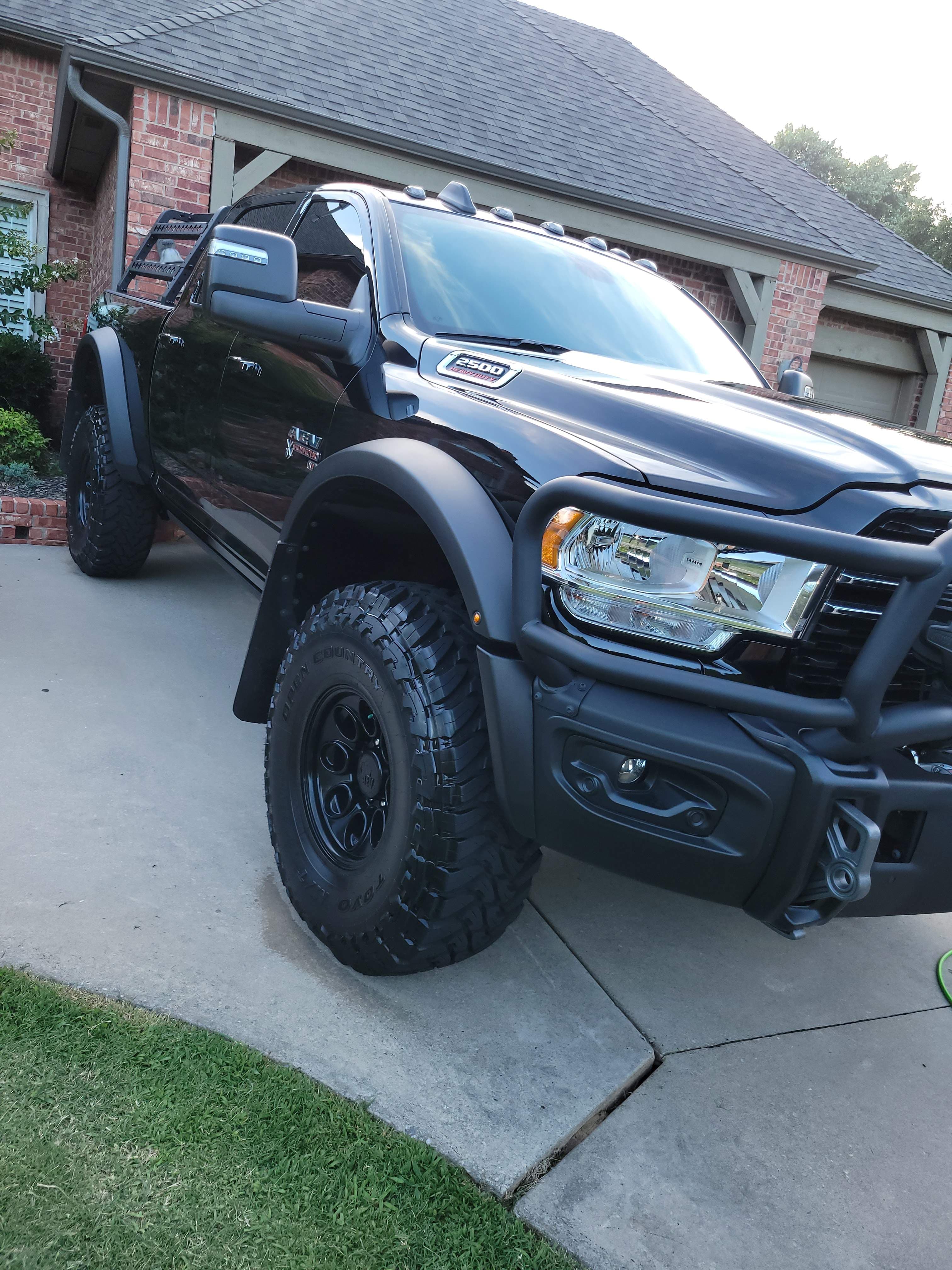 Aggressive black Ram 2500 truck looking sharp after a detail.